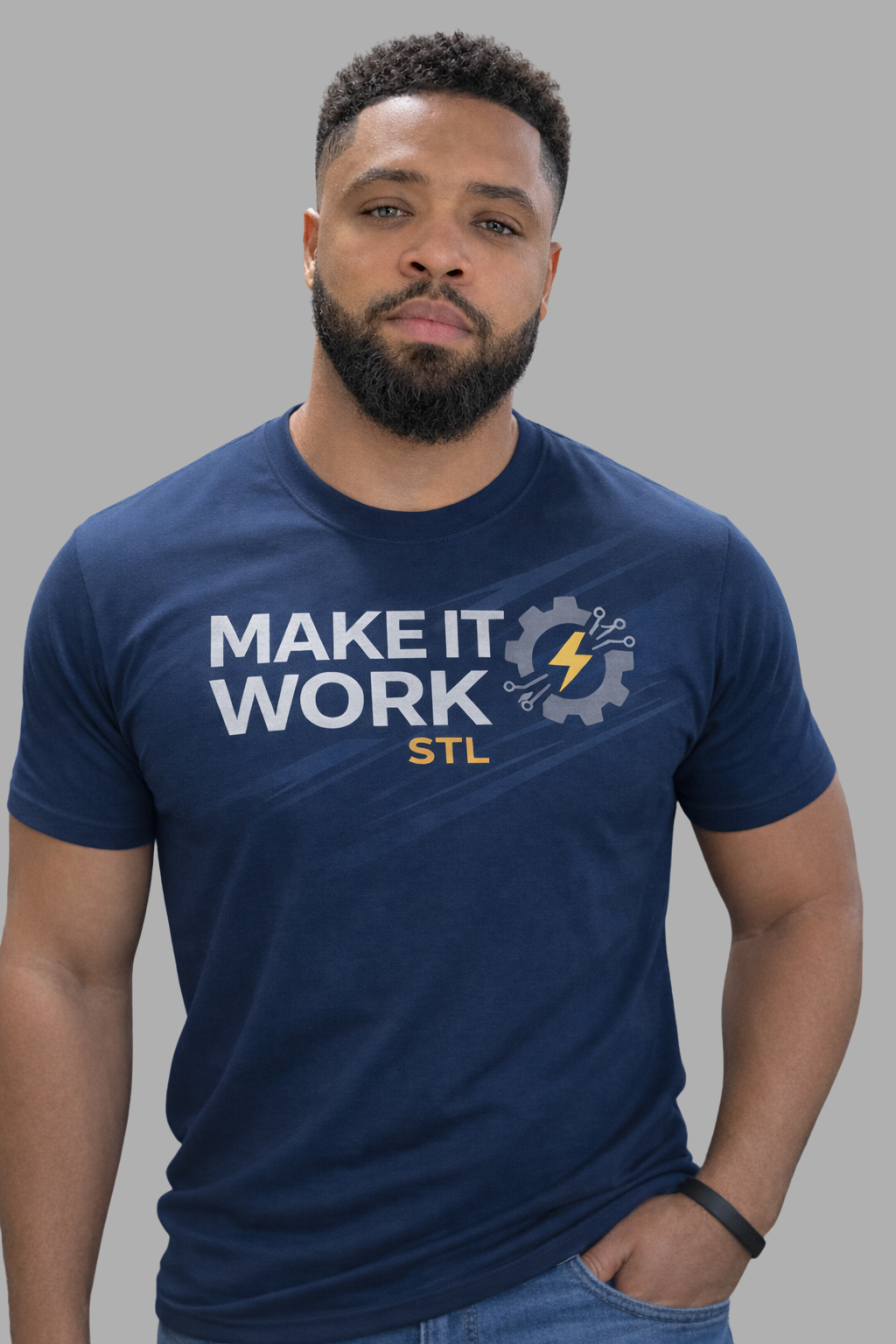 Jarrell, owner of Make It Work STL, wearing a branded company shirt